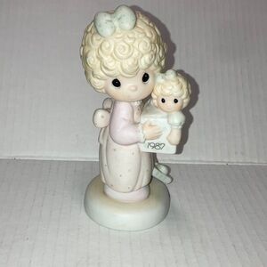 Precious MomentsLove Is The Beat Gift Of All Girl Holding Doll Figurine